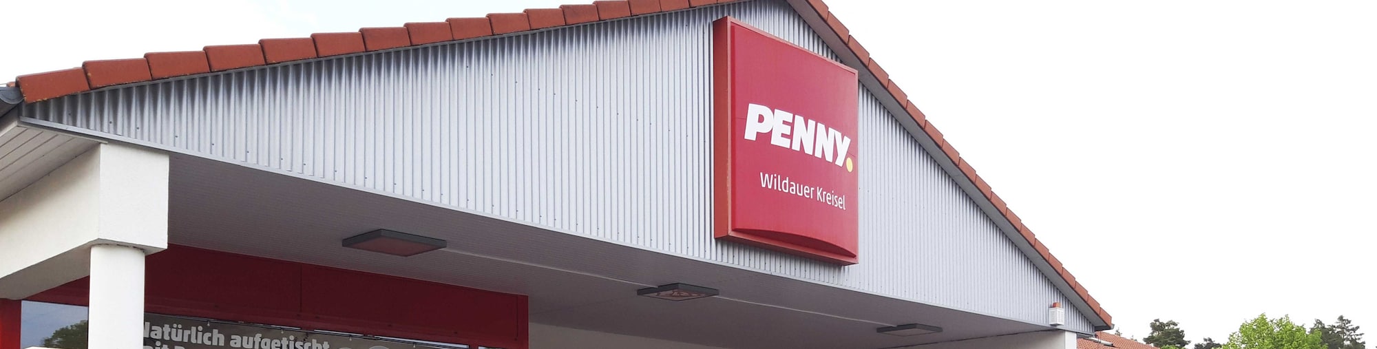 Sie sehen den Eingang vom Penny Markt in Wildau Chausseestr. 2 