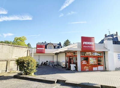 Sie sehen den Eingang vom Penny Markt in Mainz/Mombach, Hauptstr. 78