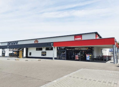 Sie sehen den Eingang vom Penny Markt in Bad Rappenau-Fürfeld, Wilhelm-Hauff-Str. 48