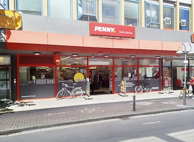 Sie sehen den Eingang vom Penny Markt in Mainz, Grosse Bleiche 17-23