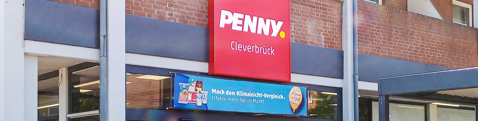 Sie sehen den Eingang vom Penny Markt in Stockelsdorf Lohstr. 178