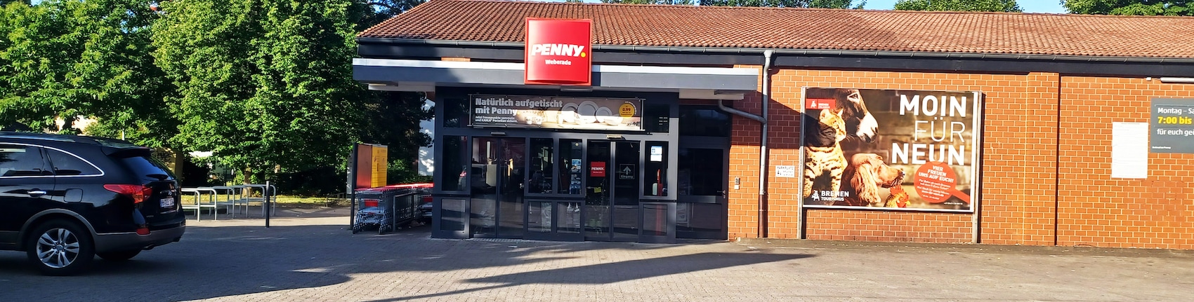 Sie sehen den Eingang vom Penny Markt in Hamburg/Lohbruegge, Weberade 3-5