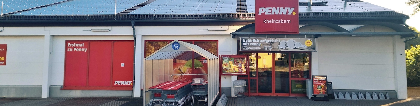 Sie sehen den Eingang vom Penny Markt in Rheinzabern, Rülzheimer Str. 1