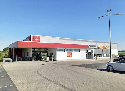 Sie sehen den Eingang vom Penny Markt in Rheinau-Linx, Tullastr. 2/1
