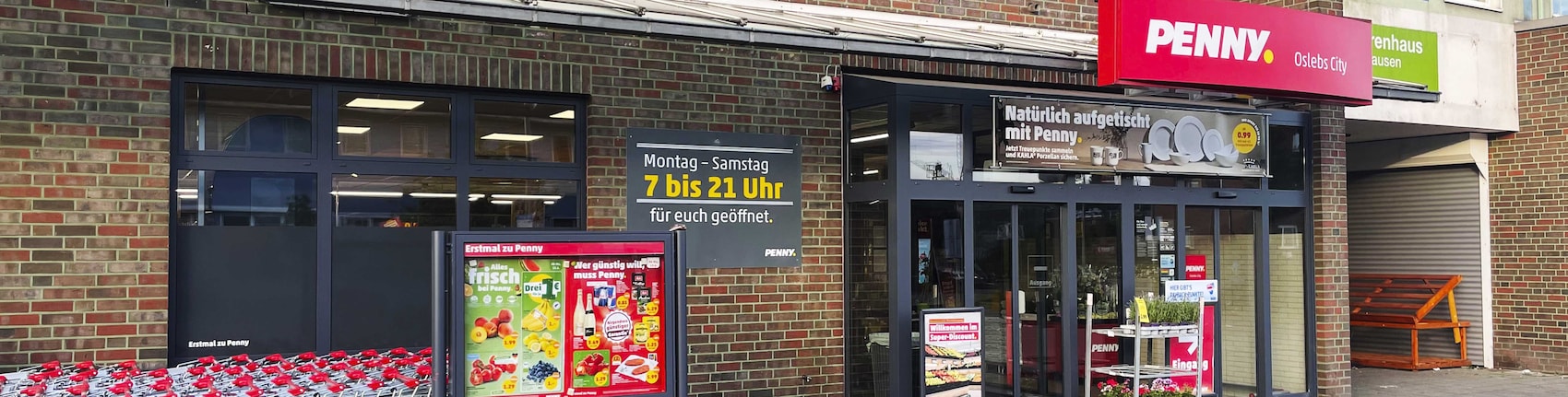 Sie sehen den Eingang vom Penny Markt in Bremen-Oslebshausen, Am Oslebshauser Bahnhof 2