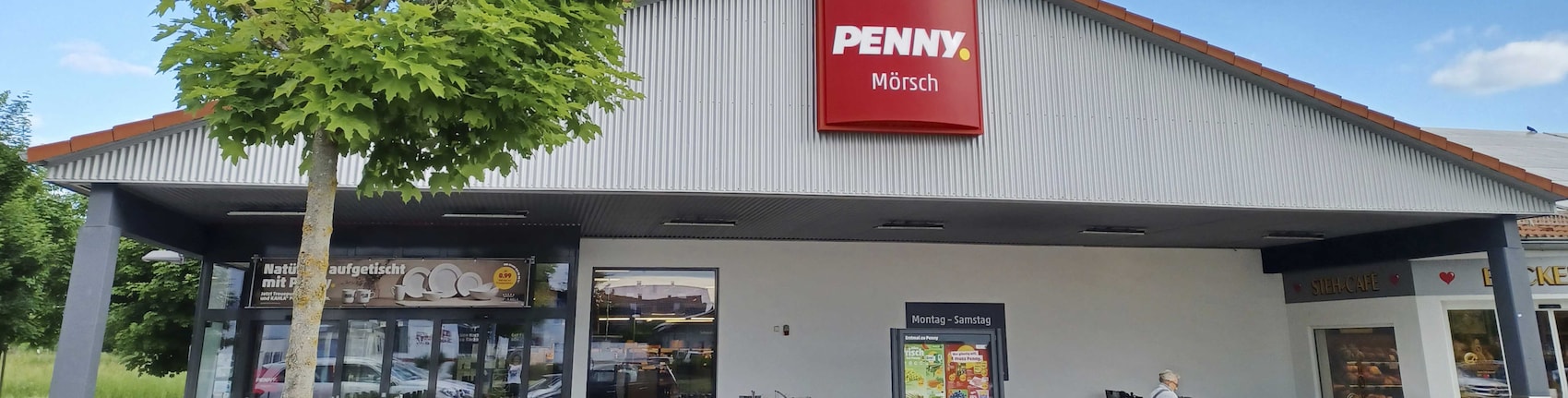 Sie sehen den Eingang vom Penny Markt in Rheinstetten, Rheinaustr. 1A