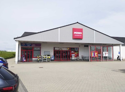 Sie sehen den Eingang vom Penny Markt in Frauenstein Freiberger Strasse 32