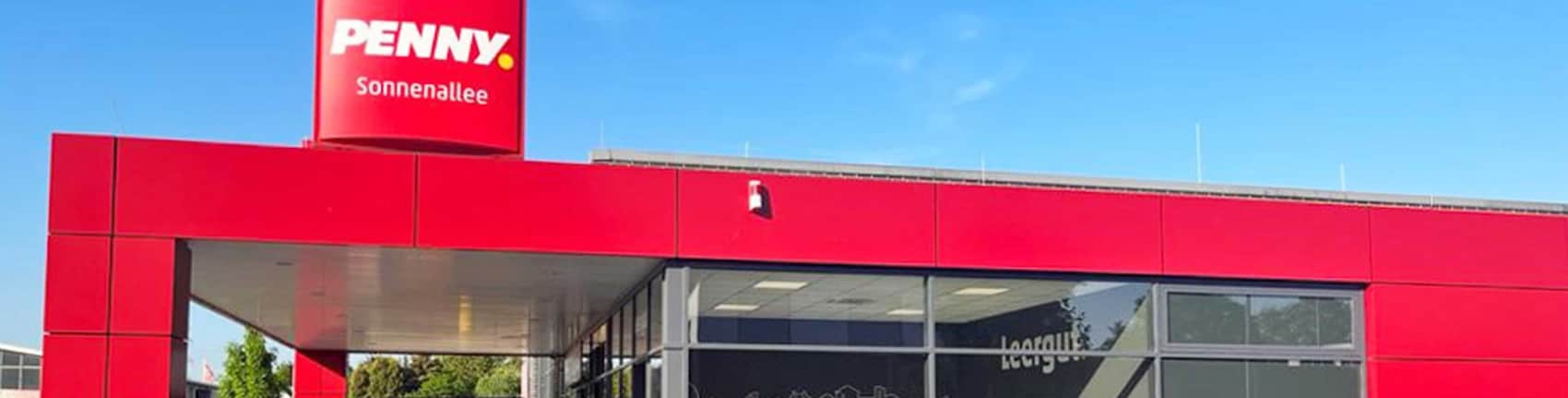 Sie sehen den Eingang vom Penny Markt in Pulheim, Sonnenallee 7