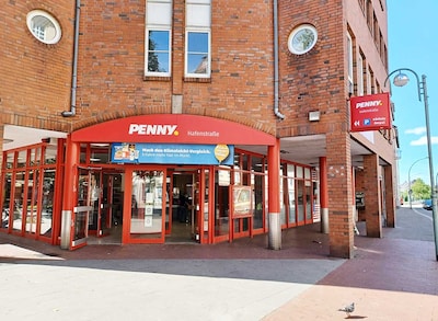 Sie sehen den Eingang vom Penny Markt in Bremerhaven/Lehe, Hafenstraße 207